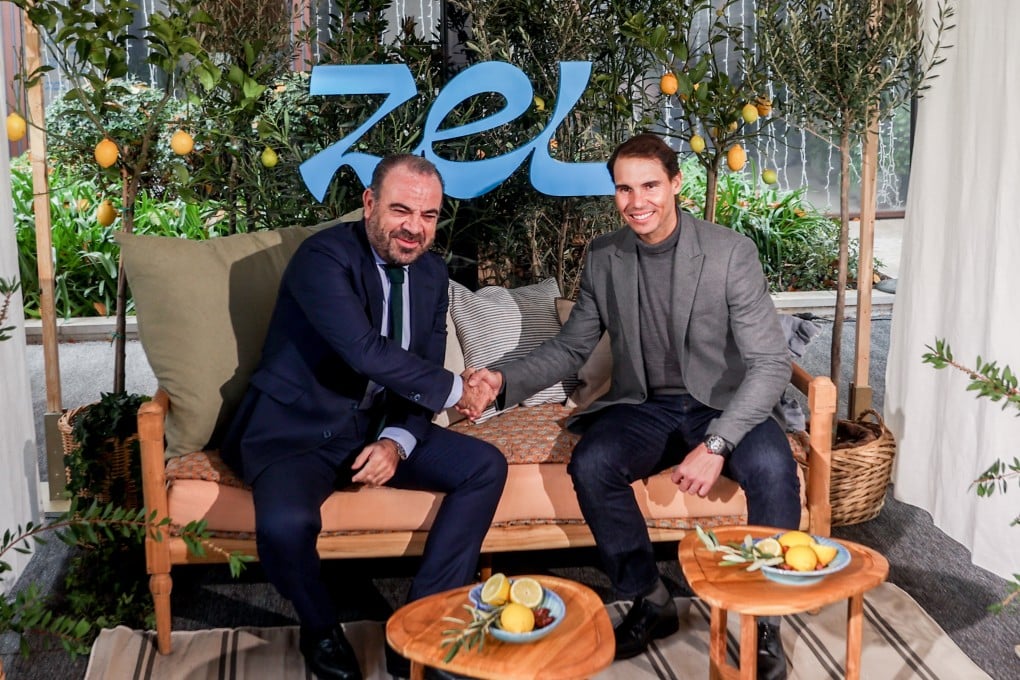 Melia Hotels International chief executive Gabriel Escarrer and tennis player Rafa Nadal shake hands at the launch of Zel, a new hotel chain, in December 2022. It is the latest example of a sports, musical or screen star lending their name to a tourism business. Photo: Getty Images