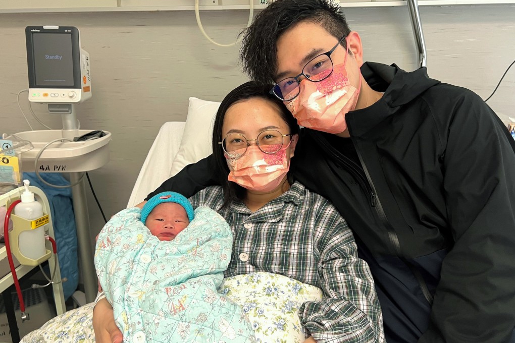 Mr and Mrs Lee with their newborn son. Photo: Handout