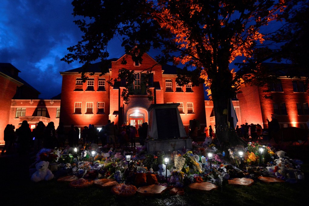 A makeshift memorial grows on the grounds of the former Kamloops Indian Residential School after the remains of 215 children were found at the site in Kamloops, British Columbia, Canada, in June. Photo: Reuters