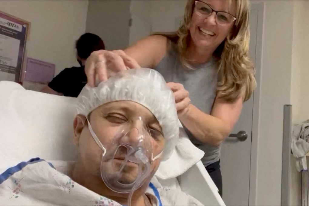 Jeremy Renner gets his head massaged during a hospital stay at an unknown location following a snow plough accident in this screen grab from a social media video on January 5. Photo: Twitter / Jeremy Renner via Reuters