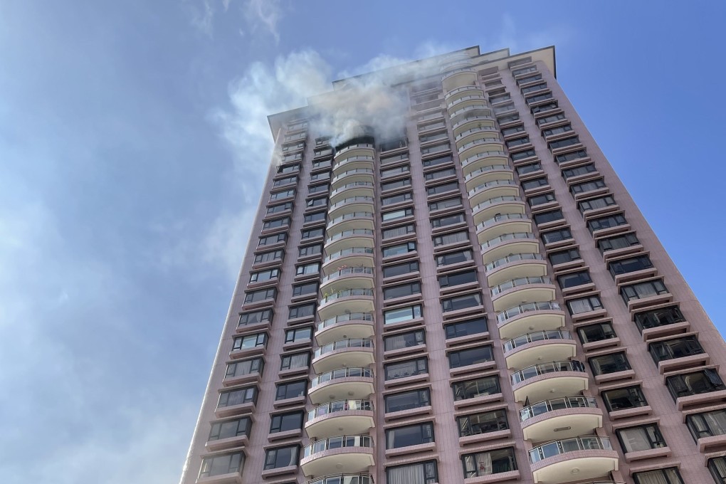 A blaze broke out at Regal Crest on Robinson Road in Mid-Levels on Sunday. Photo: Kieran Cash