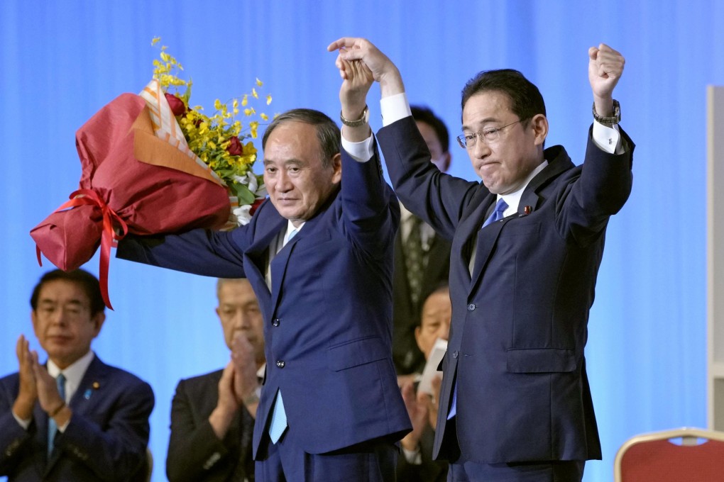 Japan’s Prime Minister Fumio Kishida (right) and his predecessor Yoshihide Suga pictured in 2021. Photo: Kyodo via Reuters