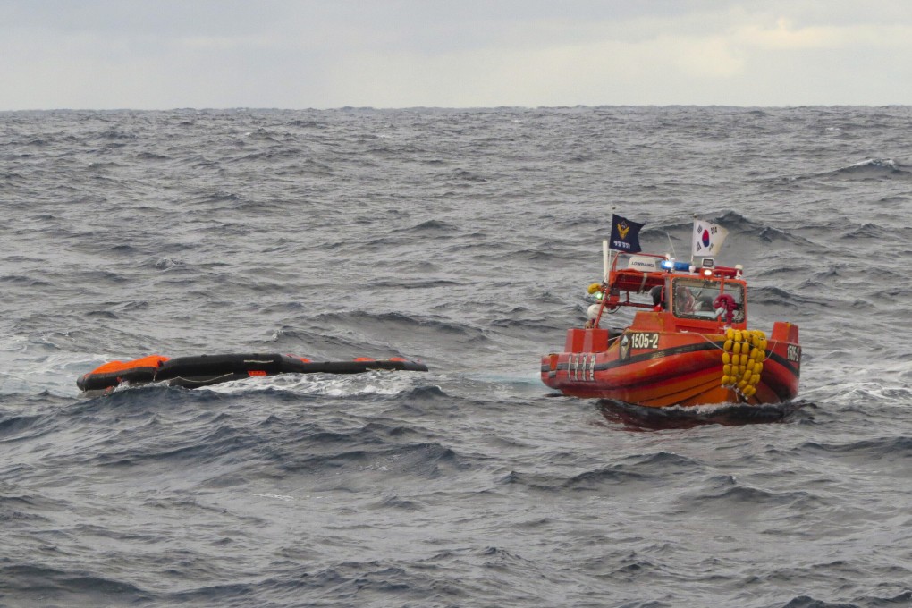 A South Korean coastguard vessel conducts a search operation in the waters between South Korea and Japan. Photo: AP