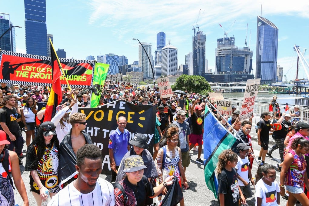 People march during an “Invasion Day” rally in Brisbane, Australia, on Thursday. Photo: EPA-EFE