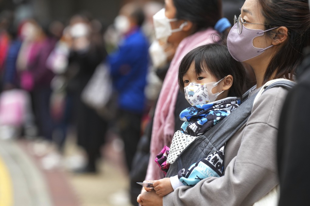 Hongkongers are still required to wear masks in most public spaces, including outdoors. Photo: Elson Li