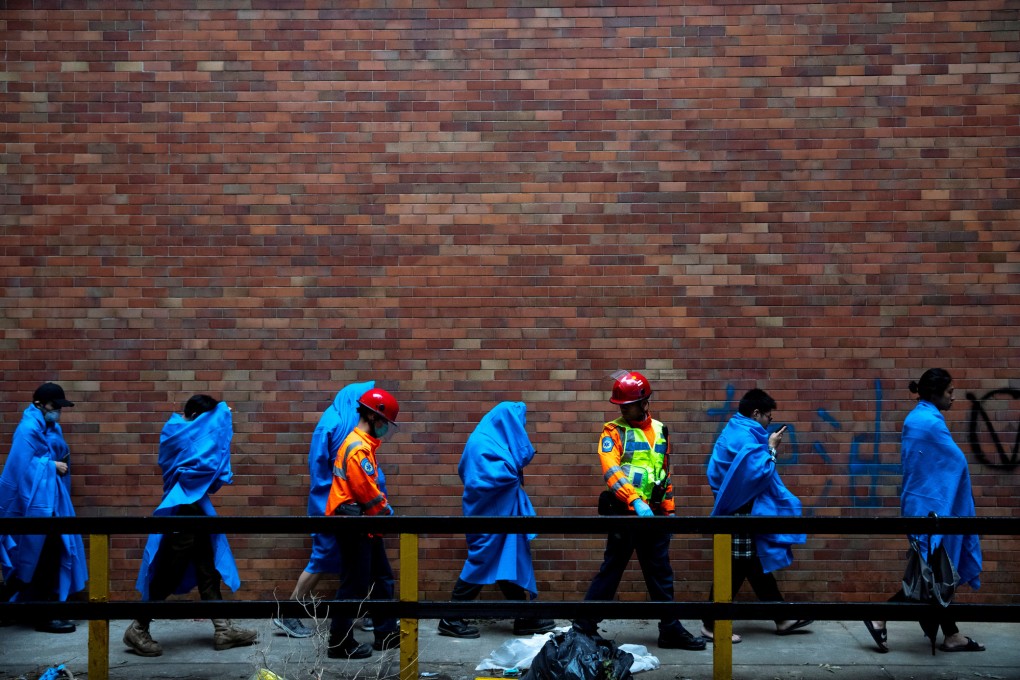 Protesters are seen after leaving the campus of the Hong Kong Polytechnic University (PolyU), on November 19, 2019. Photo: Reuters