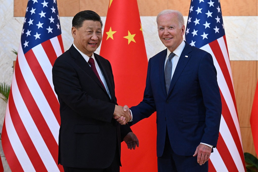 Chinese President Xi Jinping (left) and US President Joe Biden shake hands as they meet on the sidelines of the G-20 summit in Bali, Indonesia, on November 14. Photo: AFP