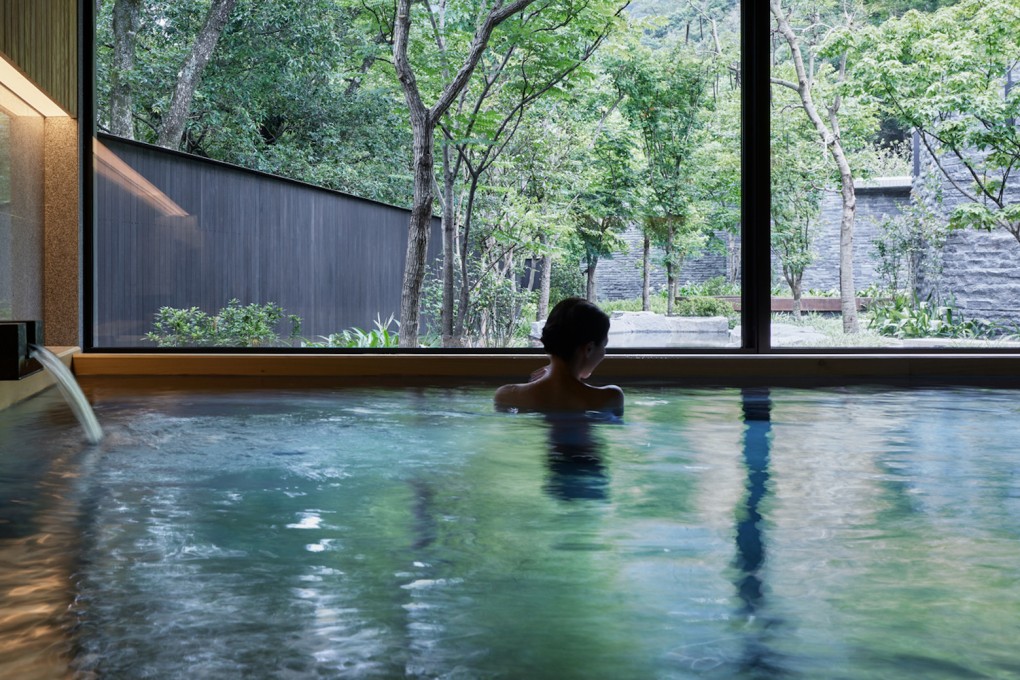 A woman bathes in a public bath at Hoshinoya Guguan, a hot-spring, or onsen, hotel, in Taiwan. Photo: Hoshino Resorts