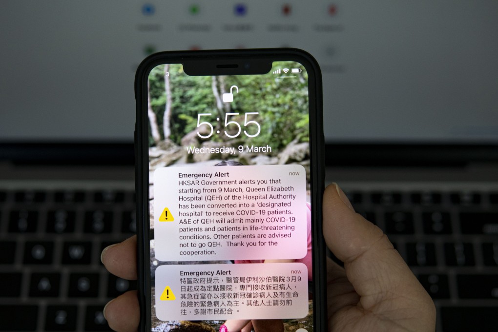 A screenshot on a phone showing an emergency alert sent by the Hong Kong government notifying the public that Queen Elizabeth Hospital had been converted to a designated Covid-19 facility on March 9, 2022. Photo: Warton Li