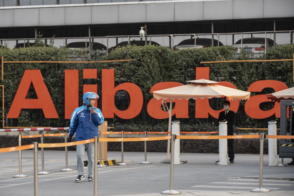 A food delivery worker exits the campus of e-commerce giant Alibaba Group Holding’s headquarters in Hangzhou, capital of eastern Zhejiang province, on January 20, 2021. Photo: Bloomberg