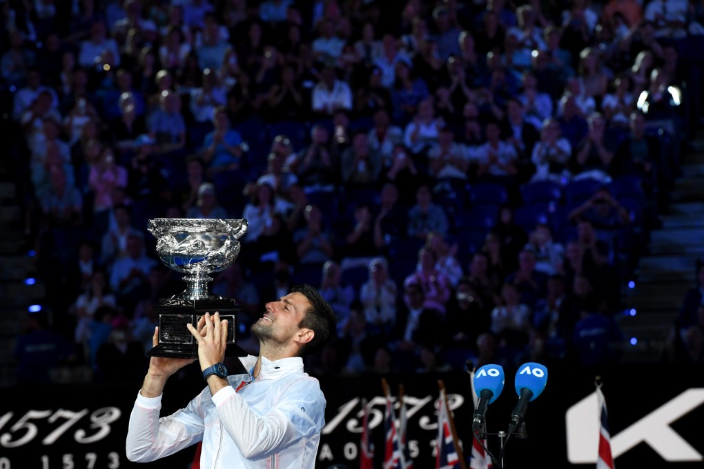 Novak Djokovic poses with his trophy after the men’s singles final at the Australian Open. Photo: Xinhua