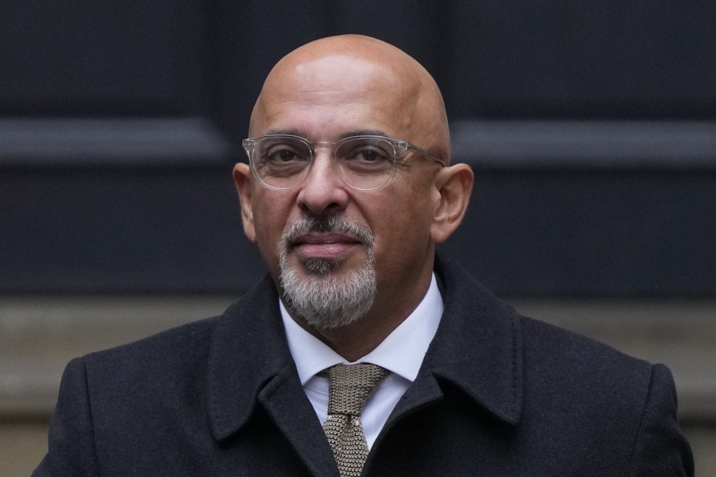 Former Conservative Party chairman Nadhim Zahawi leaves the party’s head office in Westminster, central London after being fired. Photo: AP