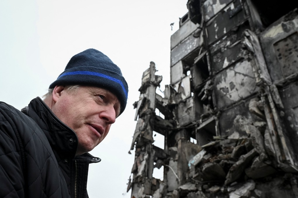 Former British prime minister Boris Johnson visiting the town of Ukrainian town of Borodianka on January 22. Photo: Reuters