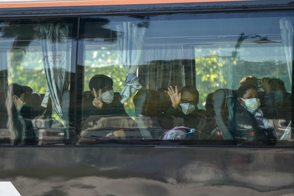 People leave the Penny’s Bay isolation centre on Lantau Island on Monday morning. Photo: Sam Tsang