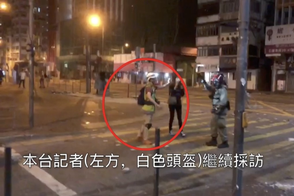 Former radio reporter Raymond Cheng at a 2019 demonstration where he was hit in the back by a police sponge grenade. Photo: Handout