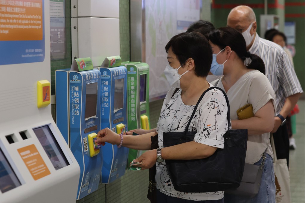 People collect their consumption vouchers at Lok Fu MTR station on October 1. Photo: Edmond So