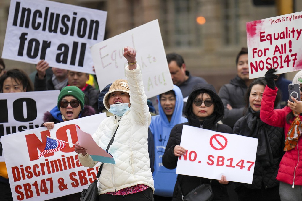 People attend a rally in opposition to Texas Senate Bill 147 on January 29 in Dallas. SB147 would outlaw real estate ownership by people from China, Iran, North Korea and Russia. Photo: TNS