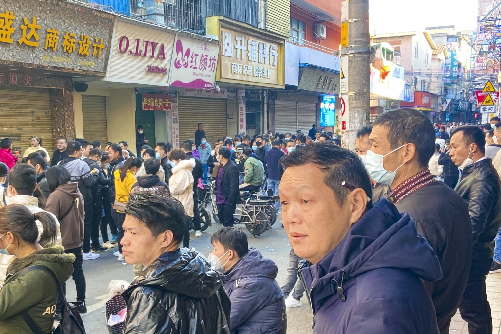 Migrant workers seek employment at an open-air job market in Guangzhou, Guangdong province, on Monday. Photo: He Huifeng