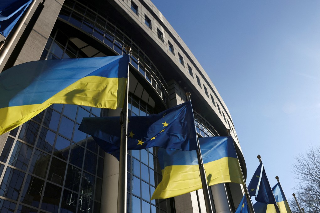 European Union and Ukraine flags flutter outside EU Parliament building in Brussels, Belgium in February 2022. Photo: Reuters