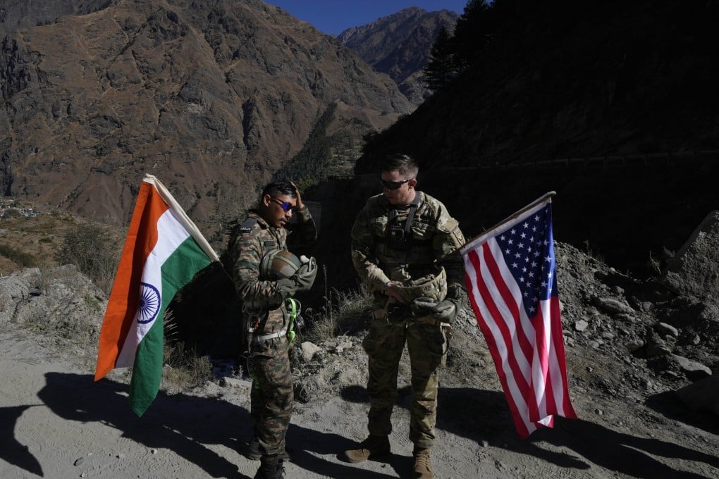 Soldiers from the Indian and US armies carry their respective flags during a break in an Indo-US joint exercise in Tapovan, in the Indian state of Uttarakhand in November 2022. Photo: AP