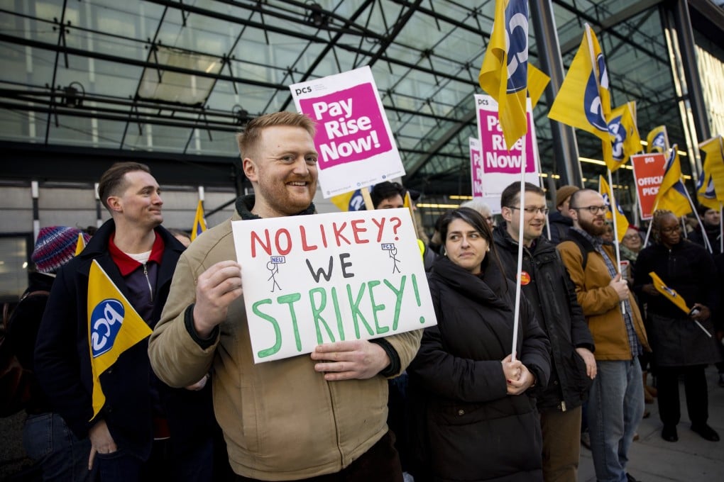 Civil servants join a picket line in London on Wednesday. Photo: EPA-EFE