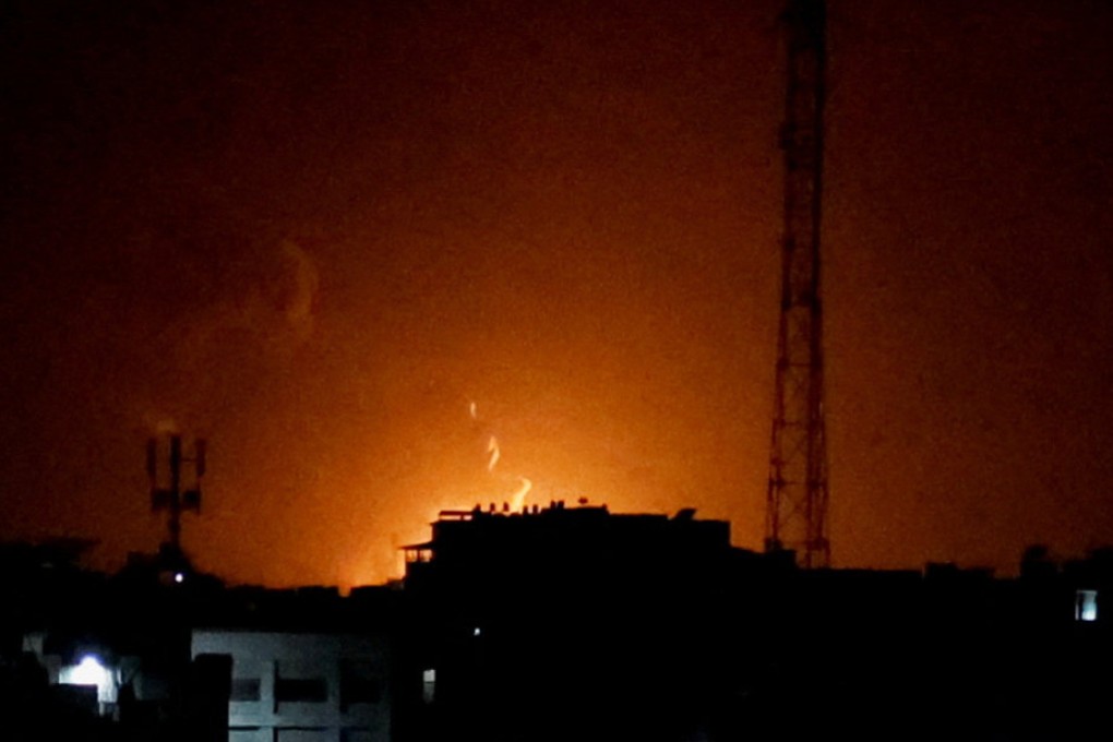 Smoke and flames rise during Israeli air strikes in Gaza City, early Thursday. Photo: Reuters