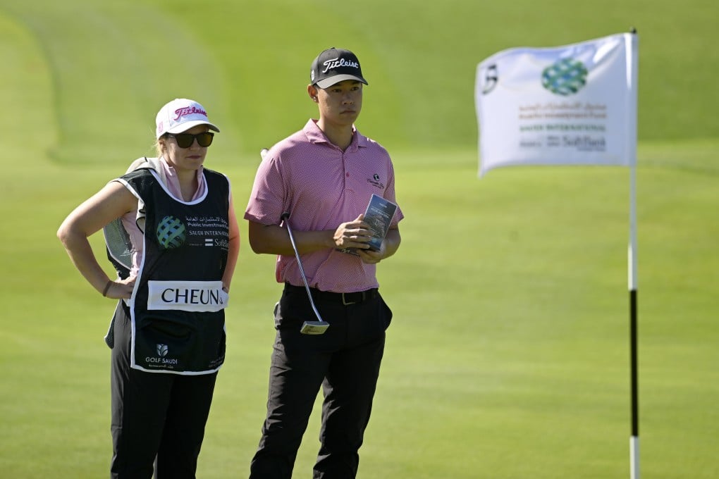 Kaitlin Cheung (left) and husband Matthew Cheung wait on the 5th green during the first round of the PIF Saudi International. Photo: Asian Tour.