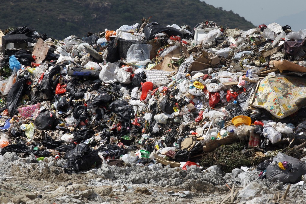 West New Territories Landfill in Nim Wan, Tuen Mun. The city plans to cut waste by charging households and businesses for disposal and speed up the downstream recycling industry. Photo: SCMP Pictures
