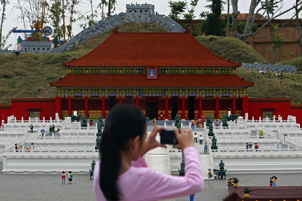 China is planning four Legoland theme parks. Asia’s first Legoland opened in Malaysia in 2012, and it featured this large-scale model of China’s Forbidden City and Great Wall. Photo: Reuters