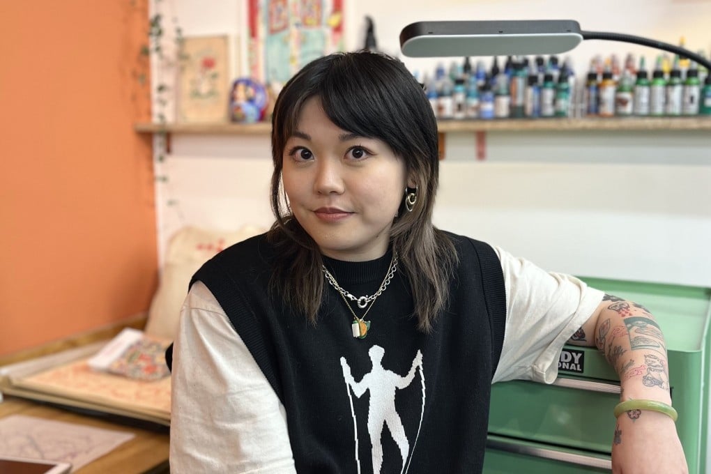 Tattoo artist Georgina Leung at her studio in London. Her nostalgic tattoos of Hong Kong and Chinese culture have won her a large following. Photo: Mabel Lui