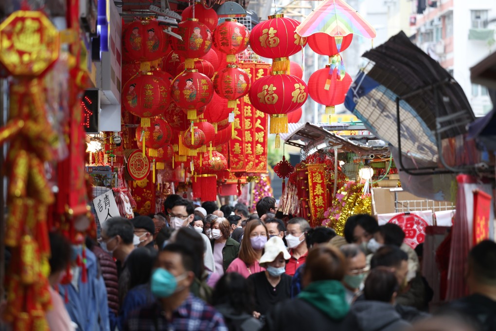 Crowds walk past Lunar New Year decorations in Hong Kong’s Sham Shui Po district on January 2. Photo: Yik Yeung-man