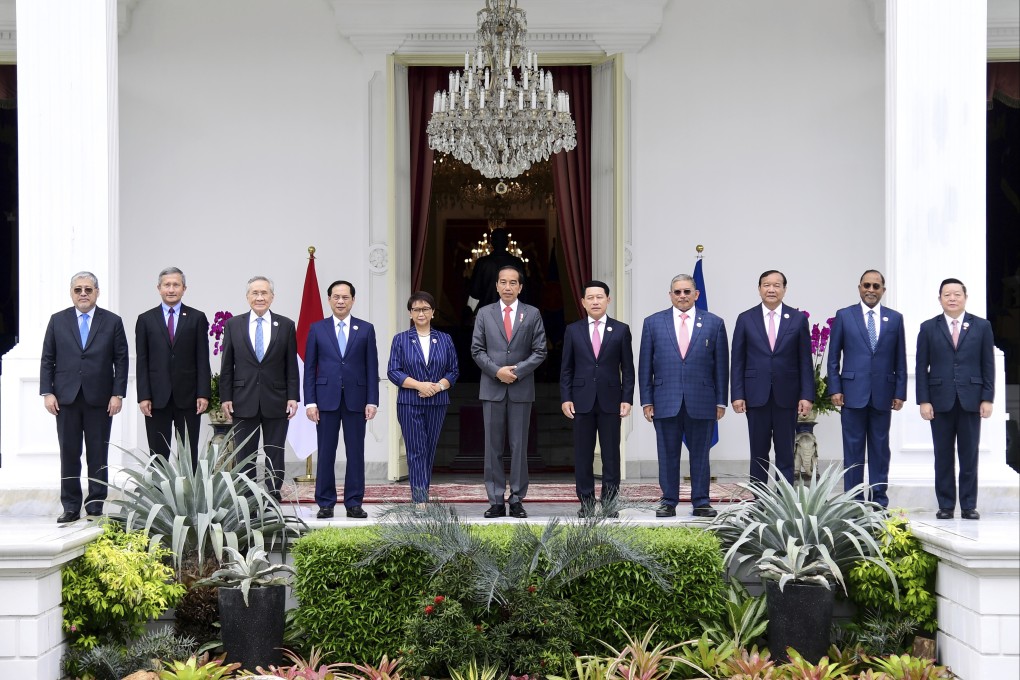 President Joko Widodo, centre,  with Asean foreign ministers. Photo: AP