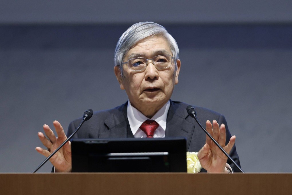 BOJ governor Haruhiko Kuroda speaks at a meeting with the Japan Business Federation in Tokyo on December 26. He said the bond yield control tweaks were not the start of an exit from monetary easing but a way to make it sustainable and run smoothly. Photo: Bloomberg