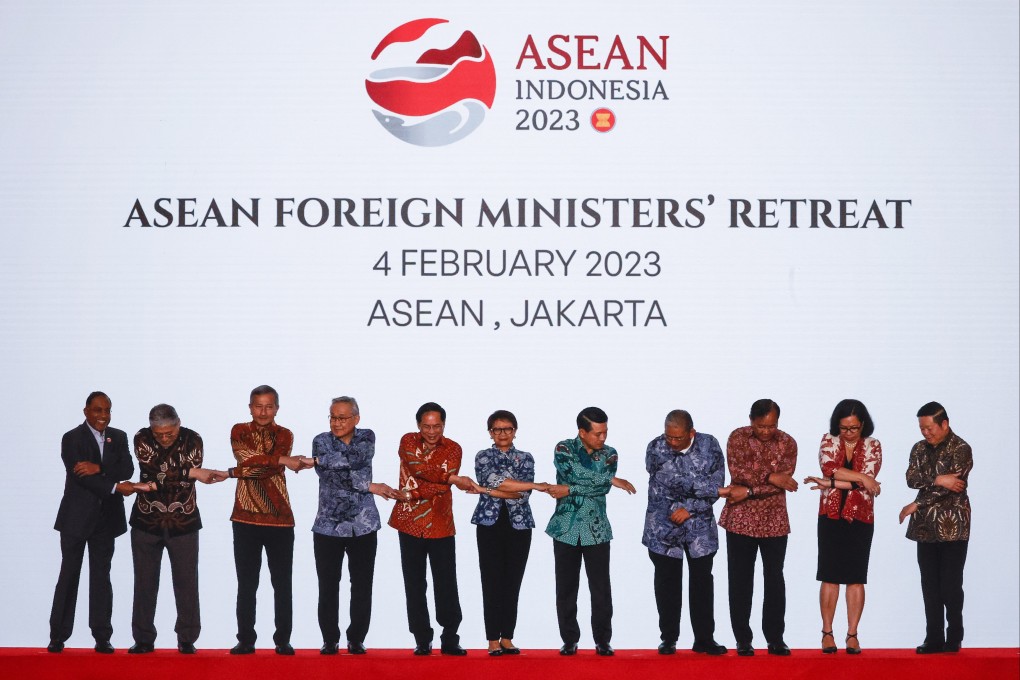Indonesian Foreign Minister Retno Marsudi (centre) joins hands with her counterparts from across Southeast Asia during Asean meetings in Jakarta on Saturday. Photo: EPA-EFE