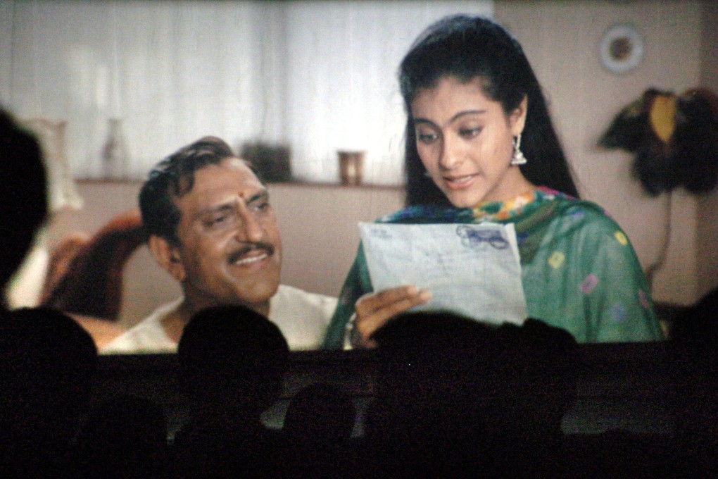 Fans watch the popular Hindi film DDLJ in a cinema in Mumbai in 2005, 10 years after it was first released. A stage version of the musical romance is being shown in the US. Photo: AFP