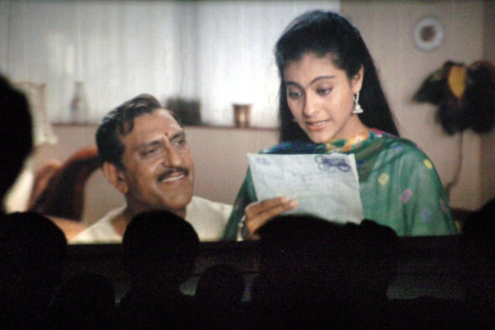 Fans watch the popular Hindi film DDLJ in a cinema in Mumbai in 2005, 10 years after it was first released. A stage version of the musical romance is being shown in the US. Photo: AFP