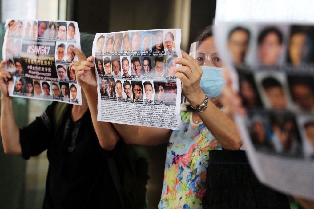 Supporters of 47 facing charges under the national security law waiting outside court in 2021. Photo: Sam Tsang