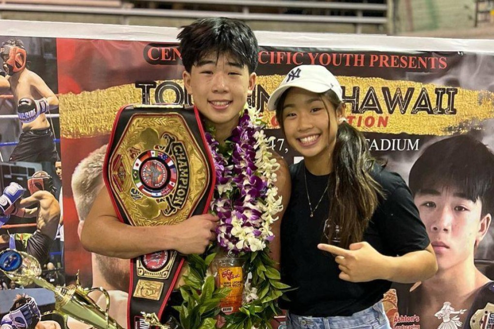 Victoria Lee (right) poses with her brother Adrian Lee after his amateur title win in December 2022. Photo: Instagram/@victorialeemma