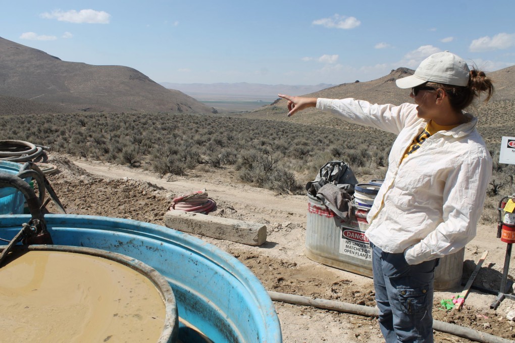 A geologist points to an area of future exploration from a drill site at the Thacker Pass lithium mine project in Nevada. File photo: The Daily Free Press via AP