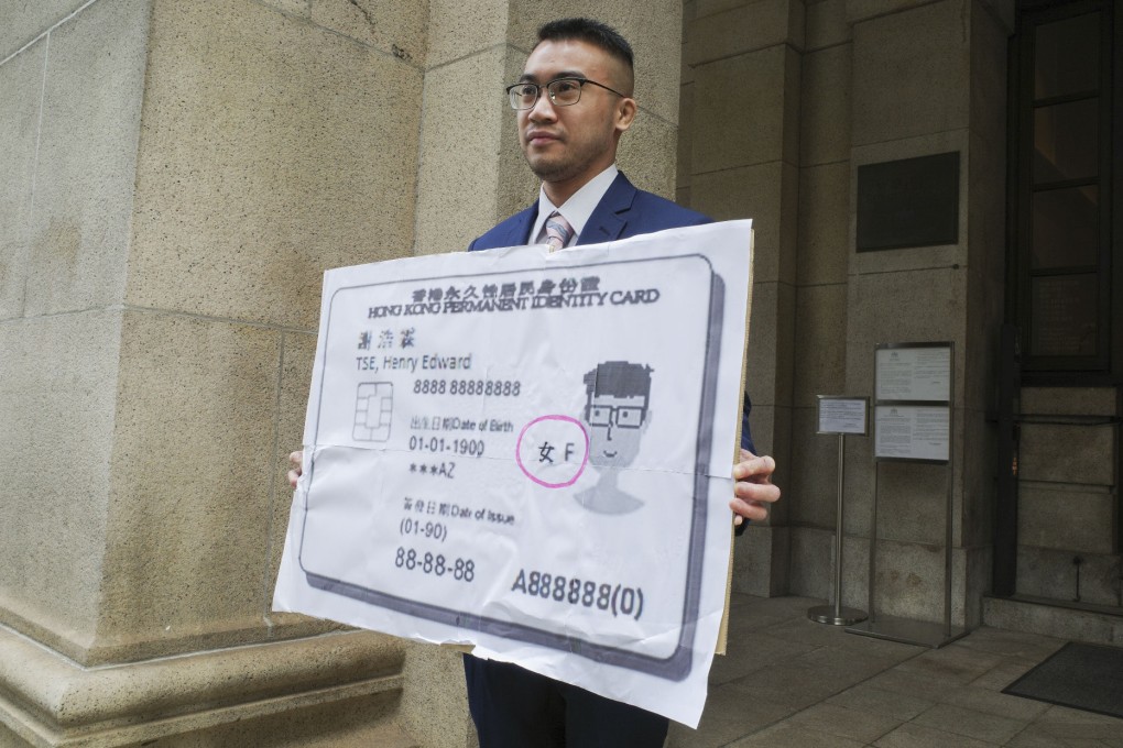 Henry Edward Tse holds a fake ID card outside the Court of Final Appeal on January 4. Photo: Chris Lau