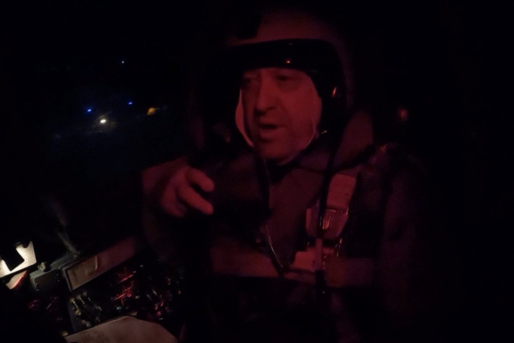Yevgeny Prigozhin, the founder of Russia’s Wagner mercenary group,  is seen inside a cockpit of a military Su-24 bomber plane over an unidentified location in footage released on Monday. Photo: Concord via Reuters