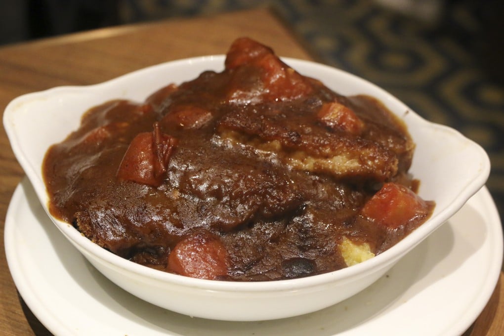 Tai Ping Koon’s baked pork chop rice with egg. The restaurant, founded in 1860 in Guangzhou and operating in Hong Kong since 1938, was the first to introduce this fusion dish of meat in a sweet-tangy sauce with fried rice. Photo: Wilson Fok