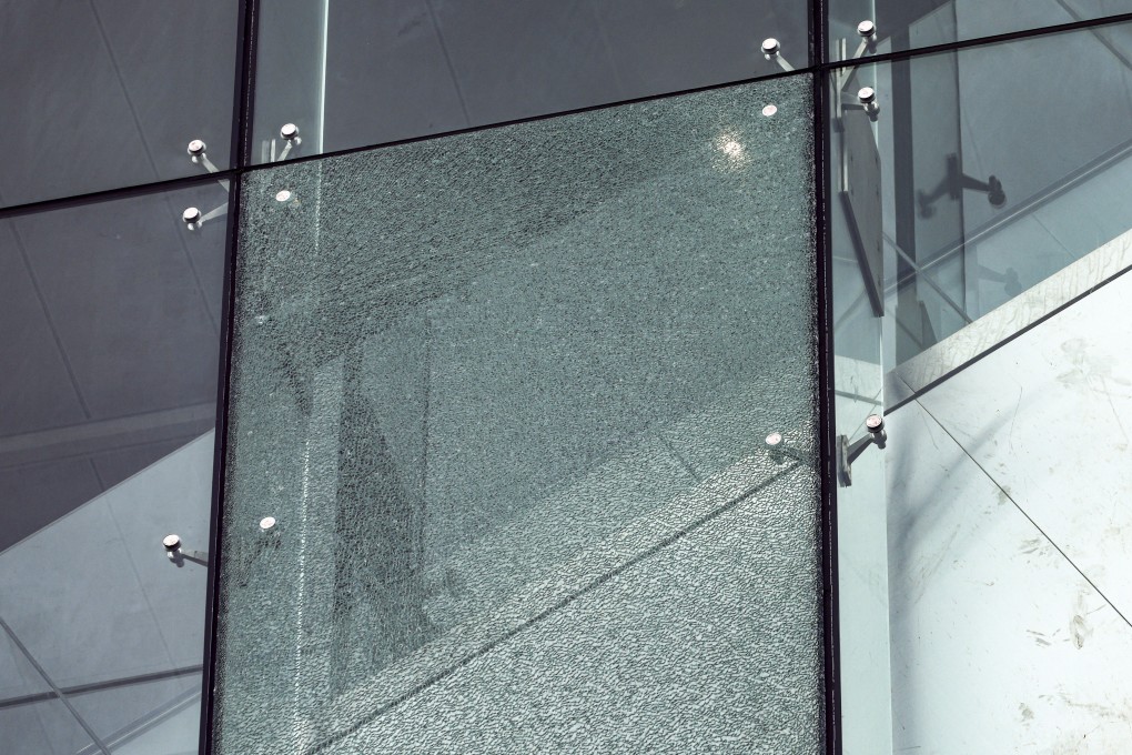 A large window at West Kowloon Court after it was hit by what is thought to have been an airgun pellet. Photo: Dickson Lee
