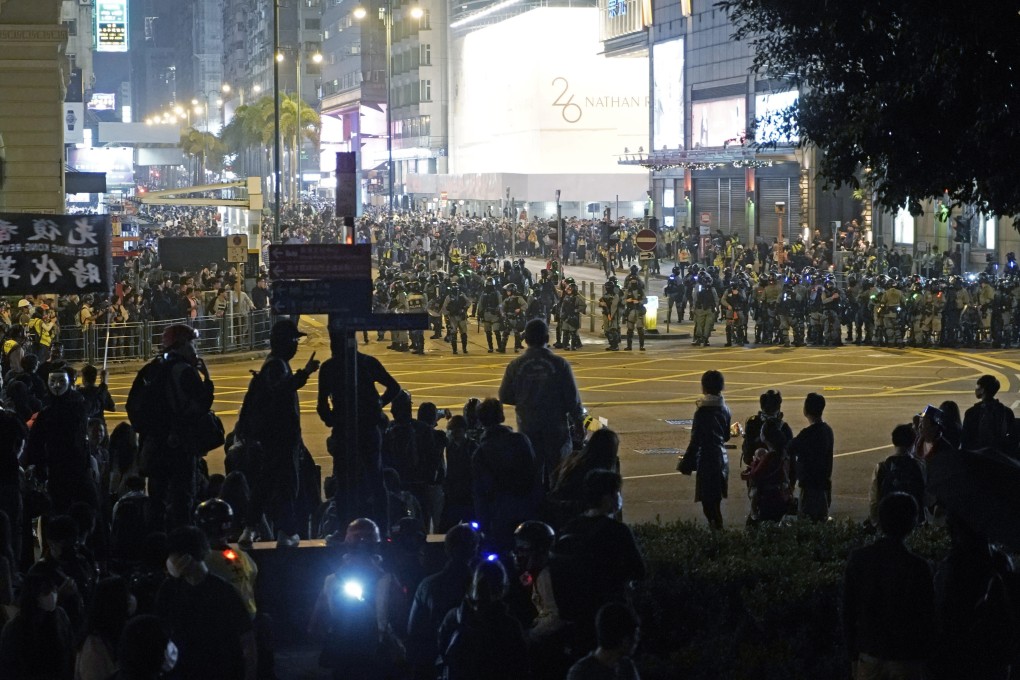 Riot police prepare to confront protesters during a rally on December 24, 2019. Of the 10,000 or so people who were arrested during the protests, 6,000 are still waiting for their cases to be processed. Photo: AP