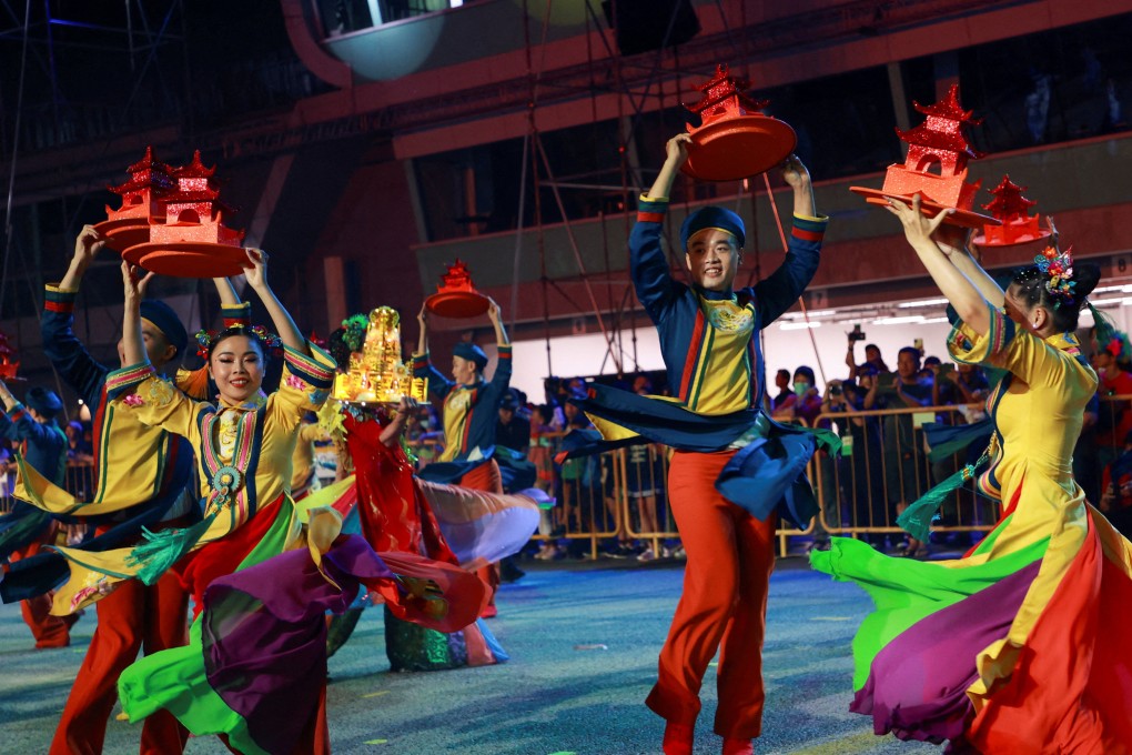 Dancers perform at Singapore’s Chingay parade, which returned after a two-year hiatus due to Covid-19. Photo: Reuters