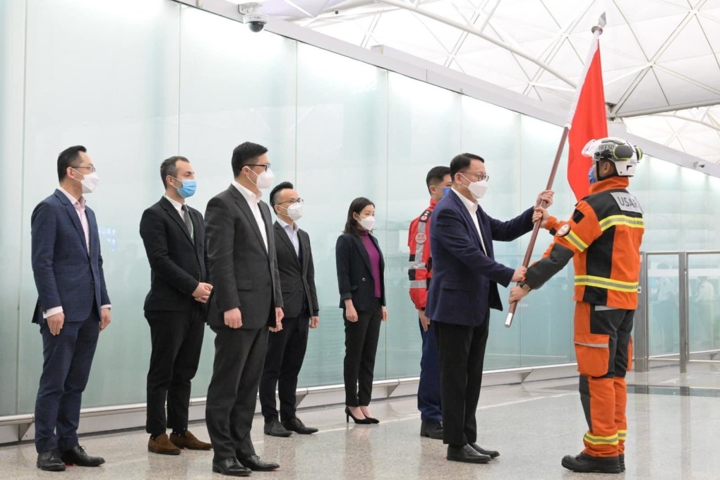 Acting chief executive Eric Chan sees the search and rescue team off at Hong Kong International Airport on Wednesday night. Photo: Handout