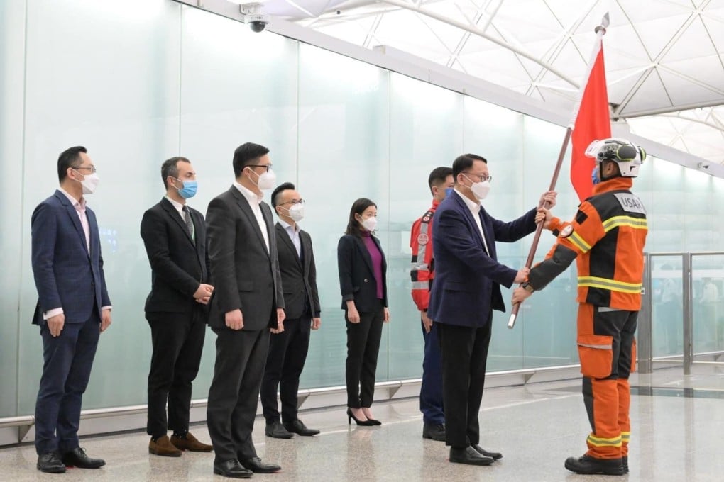 Acting chief executive Eric Chan sees the search and rescue team off at Hong Kong International Airport on Wednesday night. Photo: Handout