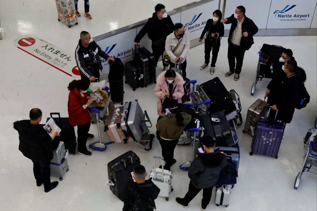 Passengers from China arrive at Narita airport near Tokyo. Photo: Reuters