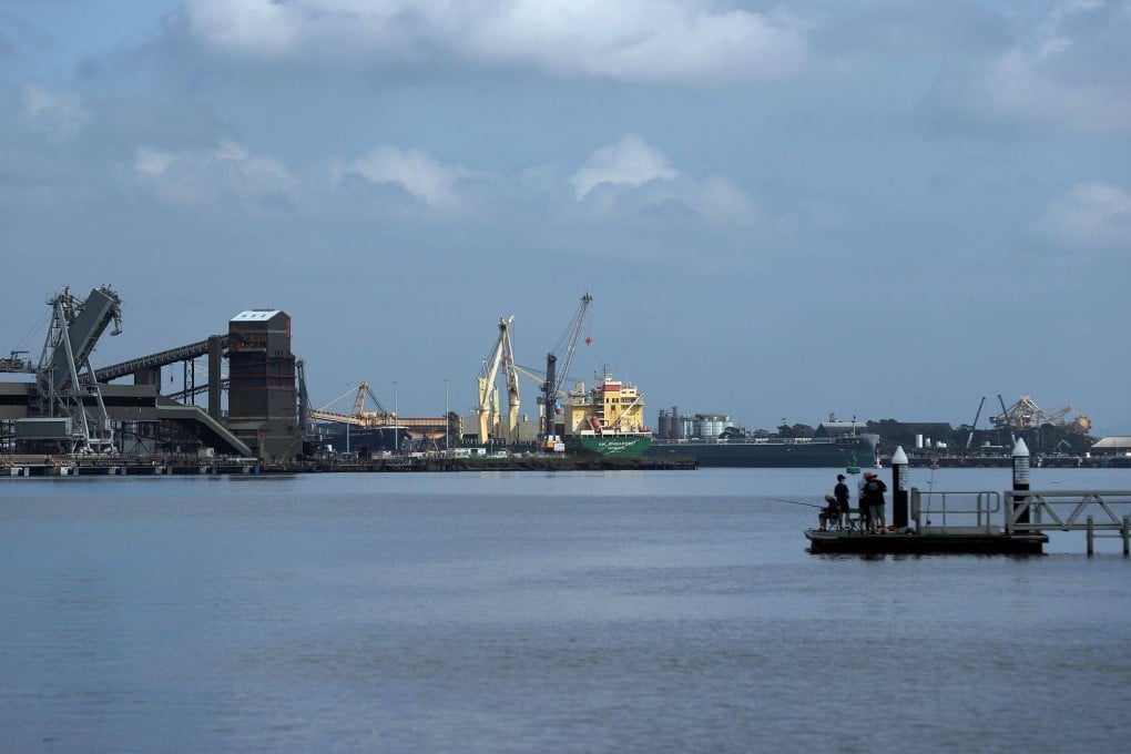 Bulk carriers docked at a coal terminal in Newcastle, Australia. Photographer: Bloomberg