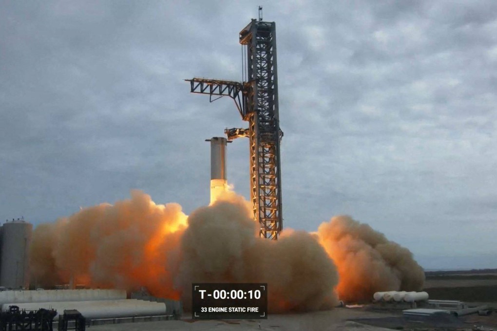 SpaceX test-fires the massive engines on the most powerful rocket ever built at a base in Boca Chica, Texas, on Thursday. Photo: SpaceX via AFP.